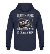 Ein Biker Hoodie für Motorradfahrer von Wingbikers mit dem Aufdruck, Echte Männer brauchen nur 2 Reifen, als Back Print, in navy blau.