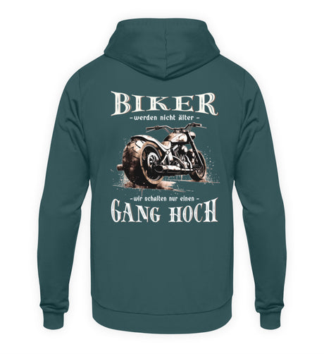 Ein Biker Hoodie für Motorradfahrer von Wingbikers mit dem Aufdruck, Biker werden nicht älter - Wir schalten nur einen Gang hoch! mit Back Print, in petrol türkis.