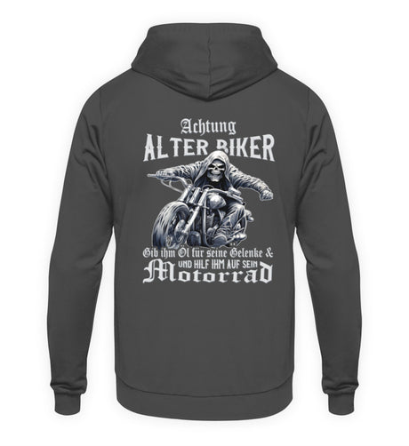 Ein Biker Hoodie für Motorradfahrer von Wingbikers mit dem Aufdruck, Achtung alter Biker - Gib ihm Öl und hilf ihm auf sein Motorrad, als Back Print - in dunkelgrau.