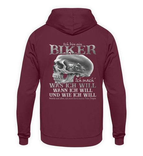 Ein Biker Hoodie von Wingbikers, mit dem Aufdruck, Ich bin ein Biker. Ich mache was ich will, wann ich will und wie ich will, warte mal eben ich muss kurz meine Frau fragen -mit Back Print, in Burgunder.