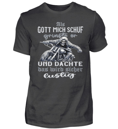 Ein Biker T-Shirt für Motorradfahrer von Wingbikers mit dem Aufdruck, Als Gott mich schuf grinste er und dachte, das wird sicher lustig! - in dunkelgrau. 