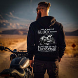 Ein Biker mit einem Hoodie für Motorradfahrer von Wingbikers mit dem Aufdruck, Du kannst Glück nicht kaufen, aber Bier und ein Motorrad und das ist verdammt nah dran! - mit Back Print, in schwarz.