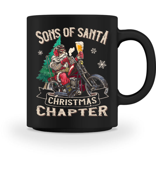 Eine Tasse für Motorradfahrer von Wingbikers, mit dem beidseitigen Aufdruck, Sons of Santa - mit Weihnachtsmann auf dem Motorrad, in schwarz.