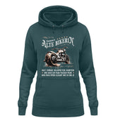 Ein Bikerin Hoodie für Motorradfahrerinnen von Wingbikers mit dem Aufdruck, Alte Bikerin - Einige Kilometer Runter - Doch elegant wie eh und je - in petrol türkis.