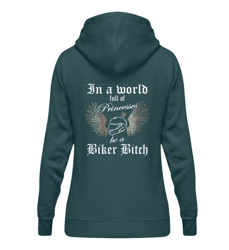 Ein Bikerin Hoodie für Motorradfahrerinnen von Wingbikers mit dem Aufdruck, In a world full of Princesses, be a Biker Bitch - mit Back Print, in petrol türkis.