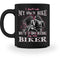 Eine Tasse für Motorradfahrerinnen von Wingbikers, mit dem beidseitigen Aufdruck, I Don't Ride My Own Bike, But I Do Ride My Own Biker, in schwarz.