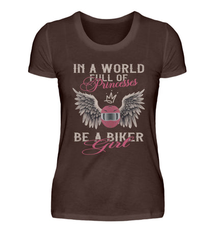 Ein T-Shirt für Motorradfahrerinnen von Wingbikers mit dem Aufdruck, In A World Full Of Princesses - Be A Biker Girl, in braun.