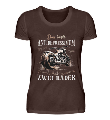 Ein T-Shirt für Motorradfahrerinnen von Wingbikers mit dem Aufdruck, Das beste Antidepressivum hat zwei Räder, in braun.