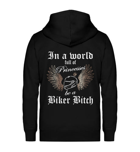 Ein Bikerin Zip-Hoodie für Motorradfahrerinnen von Wingbikers mit dem Aufdruck, In a world full of Princesses, be a Biker Bitch - in schwarz.