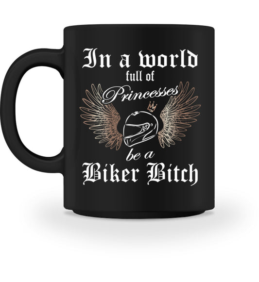 Eine Tasse für Motorradfahrerinnen von Wingbikers, mit dem beidseitigen Aufdruck, In a world full of Princesses, be a Biker Bitch, in schwarz.