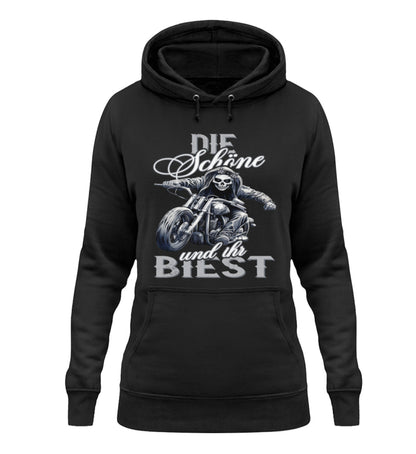 Ein Bikerin Hoodie für Motorradfahrerinnen von Wingbikers mit dem Aufdruck, Die Schöne und ihr Biest - in schwarz.
