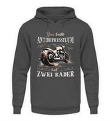 Ein Biker Hoodie für Motorradfahrer von Wingbikers mit dem Aufdruck, Das beste Antidepressivum hat zwei Räder, in dunkelgrau.