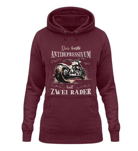 Ein Damen Hoodie für Motorradfahrerinnen von Wingbikers mit dem Aufdruck, Das beste Antidepressivum hat zwei Räder, in burgunder weinrot.