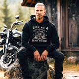 Ein Motorrad Hoodie von Wingbikers mit dem Aufdruck, Life Is A Journey - Enjoy The Ride, in schwarz.