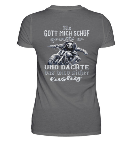 Ein Bikerin T-Shirt für Motorradfahrerinnen von Wingbikers mit dem Aufdruck, Als Gott mich schuf grinste er und dachte, das wird sicher lustig - mit Back Print, in dunkelgrau.