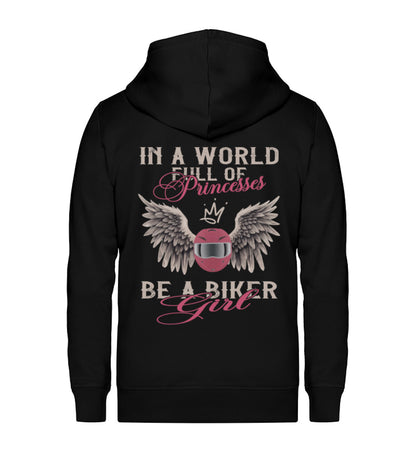 Eine Reißverschluss-Jacke für Motorradfahrerinnen von Wingbikers mit dem Aufdruck, In A World Full Of Princesses - Be A Biker Girl, in schwarz.
