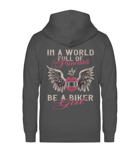 Eine Reißverschluss-Jacke für Motorradfahrerinnen von Wingbikers mit dem Aufdruck, In A World Full Of Princesses - Be A Biker Girl, in dunkelgrau.