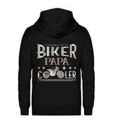 Eine Reißverschluss-Jacke für motorradfahrende Väter von Wingbikers mit dem Aufdruck, Biker Papa, wie ein normaler Papa, nur viel cooler, in schwarz.