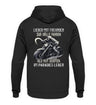 Biker Hoodie mit dem Aufdruck, Lieber mit Freunden zur Hölle fahren, als mit Idioten im Paradies leben, als Back Print in schwarz. 