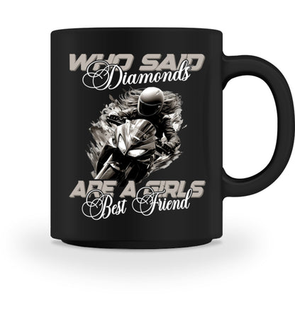 Eine Tasse für Motorradfahrerinnen von Wingbikers, mit dem beidseitigen Aufdruck, Who Said Diamonds Are A Girls Best Friend, in schwarz.