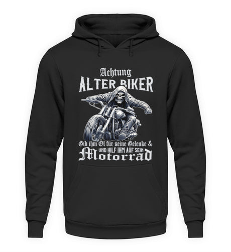 Ein Biker Hoodie für Motorradfahrer von Wingbikers mit dem Aufdruck, Achtung alter Biker - Gib ihm Öl und hilf ihm auf sein Motorrad - in schwarz.