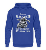 Ein Biker Hoodie für Motorradfahrer von Wingbikers mit dem Aufdruck, Achtung alter Biker - Gib ihm Öl und hilf ihm auf sein Motorrad - in royal blau.