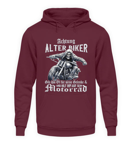 Ein Biker Hoodie für Motorradfahrer von Wingbikers mit dem Aufdruck, Achtung alter Biker - Gib ihm Öl und hilf ihm auf sein Motorrad - in burgunder weinrot.